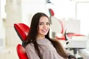 young woman in dental chair